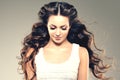 Model with long hair. Waves Curls Hairstyle. Hair Salon. Updo. F