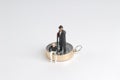 model miniature on compass on white back ground Royalty Free Stock Photo