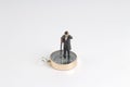 model miniature on compass on white back ground Royalty Free Stock Photo