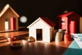 Model of miniature houses made of wood and gold coins. Generative AI