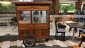 A model of the most popular hawker cart in Indonesia made of wood with a pair of wheels