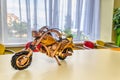 Model of a motorcycle made of wood