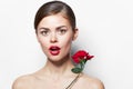 Model naked shoulders Red lips charm rose luxury clear skin Royalty Free Stock Photo