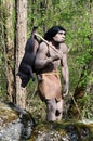 Model of Neanderthal Hunter Carrying Pig