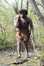 Model of Neanderthal Man Carrying Bundle of Sticks