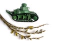 Model of an old Soviet tank made of paper on a white background. Willow branch in the foreground. Side view Royalty Free Stock Photo