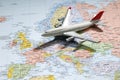 Model of a passenger aircraft on Europe Map Royalty Free Stock Photo