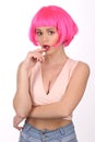 Model with pink hair touching her lips. Close up. White background Royalty Free Stock Photo