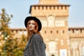 Model pose for a portrait with the Castello Sforzesco at the background in Milano Royalty Free Stock Photo