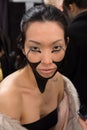 A model posing backstage at the FTL Moda fashion show during MBFW Fall 2015
