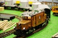 Model train with freight train pulled by historic electric locomotive