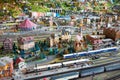 Model railroad display with trains and buildings