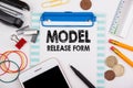 Model Release Form concept. Office desk with stationery Royalty Free Stock Photo