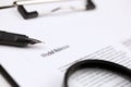 Model Release on A4 tablet lies on office table with pen and magnifying glass Royalty Free Stock Photo