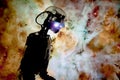Model of a Robot Illuminated by an image of a nebula