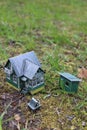 A model of a Russian country house with a barn and a well. Royalty Free Stock Photo