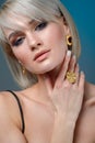 Model in set of jewelery. Luxury girl in shine jewelry from prec