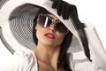 Model in striped hat and sunglasse