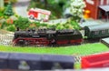 Model of train on railstation. Royalty Free Stock Photo
