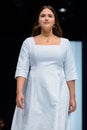 Model walk runway for FABERLIC by VALENTIN YUDASHKIN catwalk at Autumn-Winter 2017-2018 Moscow Fashion Week. Plus-size fashion mod