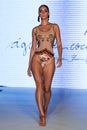 A model walks runway at the  Aqua de Coco show at Planet Fashion TV show Royalty Free Stock Photo