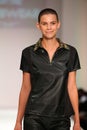 A model walks the runway at the ClubWear fashion show during Spring 2016 New York Fashion Week