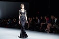 A model walks runway in Dany Tabet dress at the New York Life fashion show during MBFW Fall 2015 Royalty Free Stock Photo