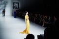 A model walks runway in Dany Tabet dress at the New York Life fashion show during MBFW Fall 2015 Royalty Free Stock Photo