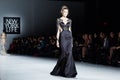 A model walks runway in Dany Tabet dress at the New York Life fashion show during MBFW Fall 2015 Royalty Free Stock Photo