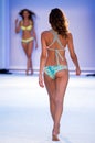 A model walks runway in designer swim apparel during Maaji - Protela Colombian Brands fashion show