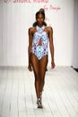 A model walks runway in designer swim apparel during the 6 Shore Road fashion show Royalty Free Stock Photo