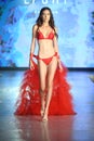 A model walks the runway for Eight Swim Show