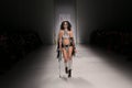 A model walks the runway at the FTL Moda fashion show during Mercedes-Benz Fashion Week Fall 2015