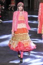 A model walks the runway during the Manish Arora show