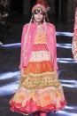 A model walks the runway during the Manish Arora show