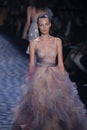 A model walks the runway at the Marchesa fashion show
