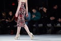 A model walks runway at the New York Life fashion show during MBFW Fall 2015