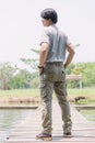 Model wearing sofe green color cargo pants or cargo trousers