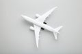 Model white airplane on a grey background Royalty Free Stock Photo