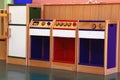 Model of wooden kitchen to play in kindergarten Royalty Free Stock Photo