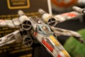 Model of X-Wing starfighter plane from Star Wars franchise movies.