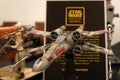 Model of X-Wing starfighter plane from Star Wars franchise movies.