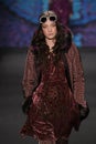 Model Yumi Lambert walks the runway at the Anna Sui fashion show during MBFW Fall 2015