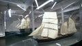 Models of ancient ships in Museum Windows. Action. National Maritime Museum with small models of large old ships in