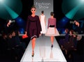 Models on catwalk on fashion trends review show