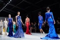Models walk runway in Dany Tabet dress at the New York Life fashion show during MBFW Fall 2015 Royalty Free Stock Photo