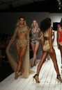 Models walk runway in designer swim apparel during the Furne Amato fashion show