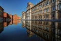 Modena, detail of Piazza Roma with military academy reflected on the water Royalty Free Stock Photo