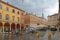 MODENA, ITALY: colorful city center buildings on a rainy day