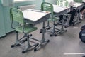 Moderd school smart classroom. View of elementary class room no kid or teacher with chairs and deskd tables in campus